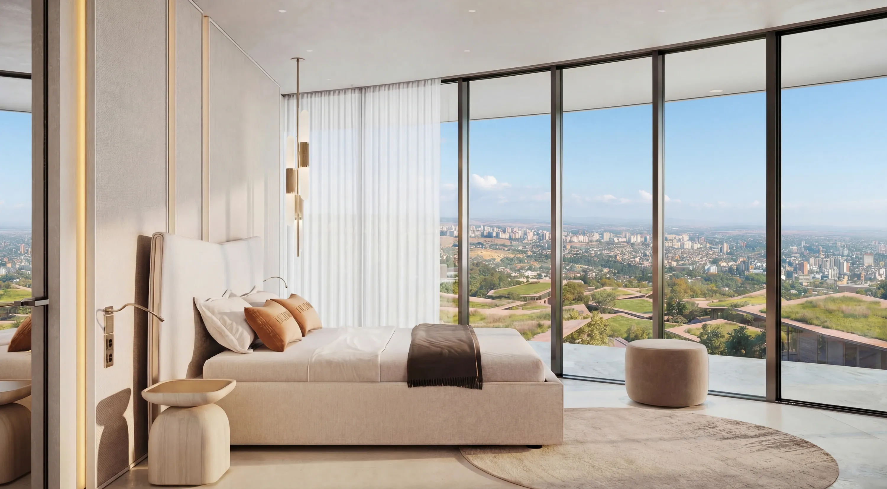 A Trussardi Casa bedroom with full-height glazing over the hills
