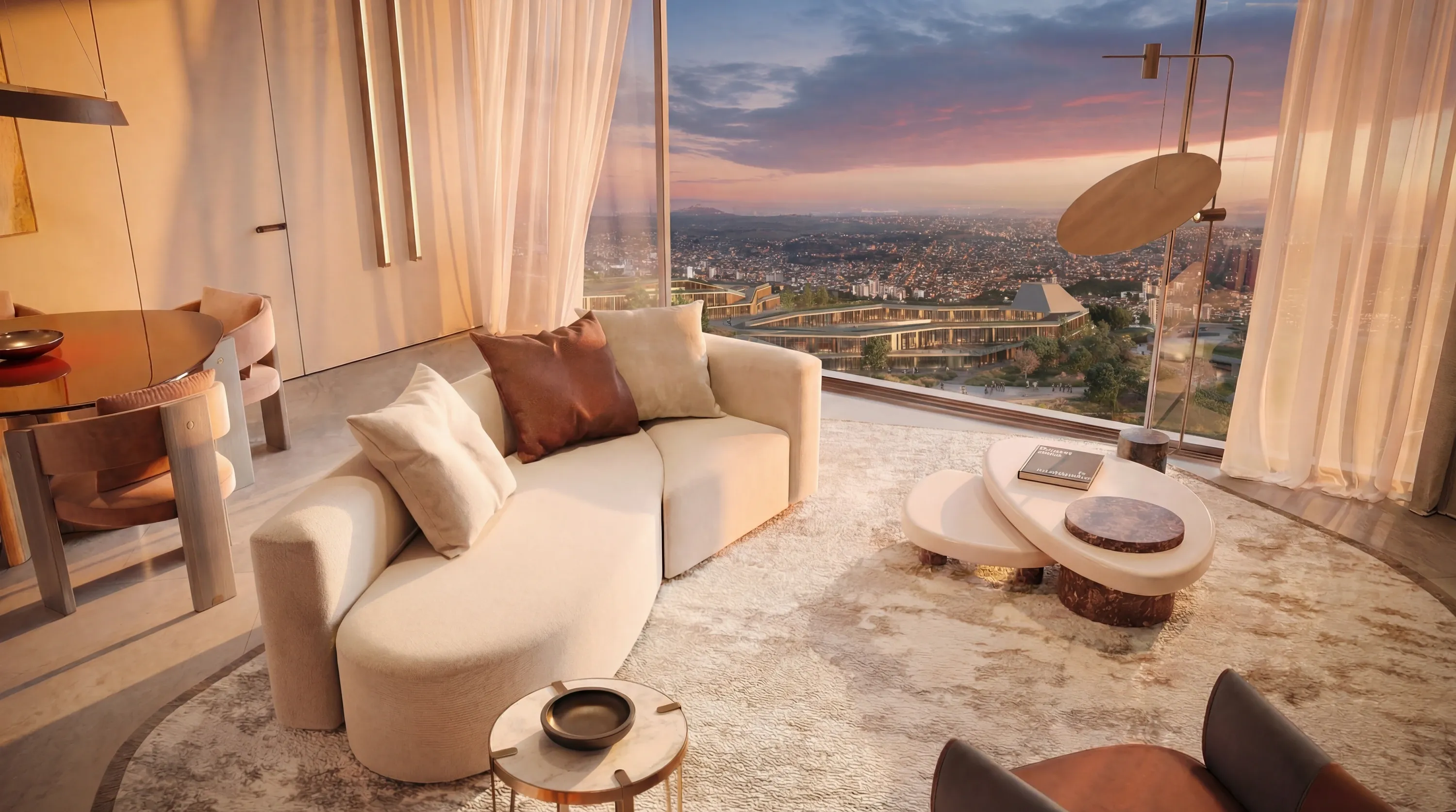 A Trussardi Casa living room with a panoramic view over Tbilisi at sunset